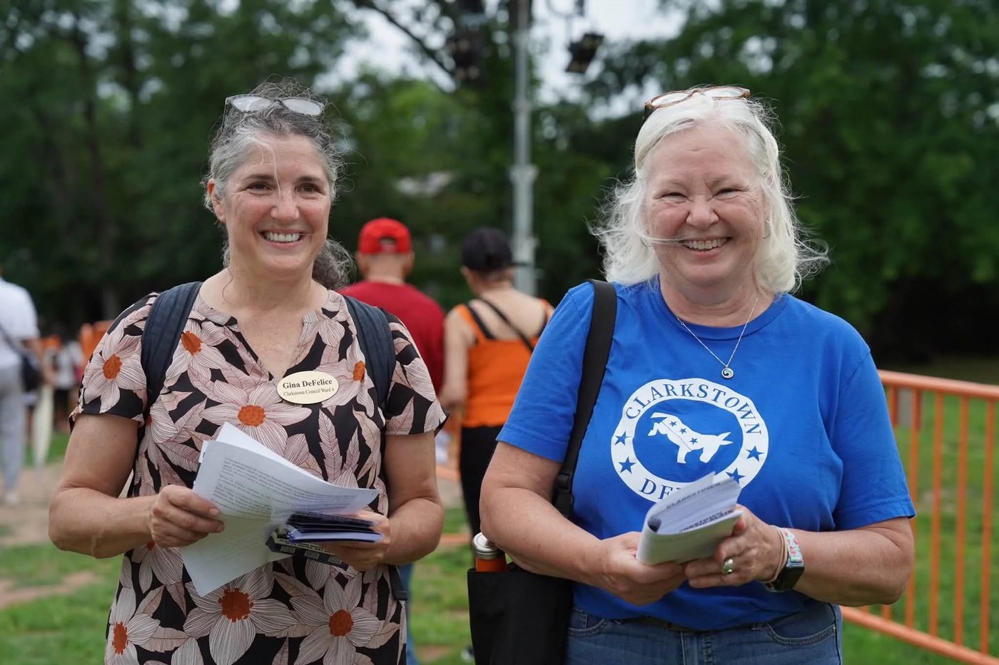 Susan Bloom with Gina DeFelice at the drone show, both carrying campaign literature